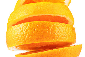 Sliced orange fruit isolated on white background., a Food & Drink Photo by Volff