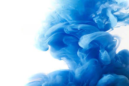 Blue clouds of ink in liquid isolated on white, an Abstract Photo by eleana