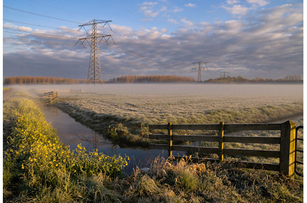 Morning fog above a meadow with, a Nature Photo by John Stuij Photography