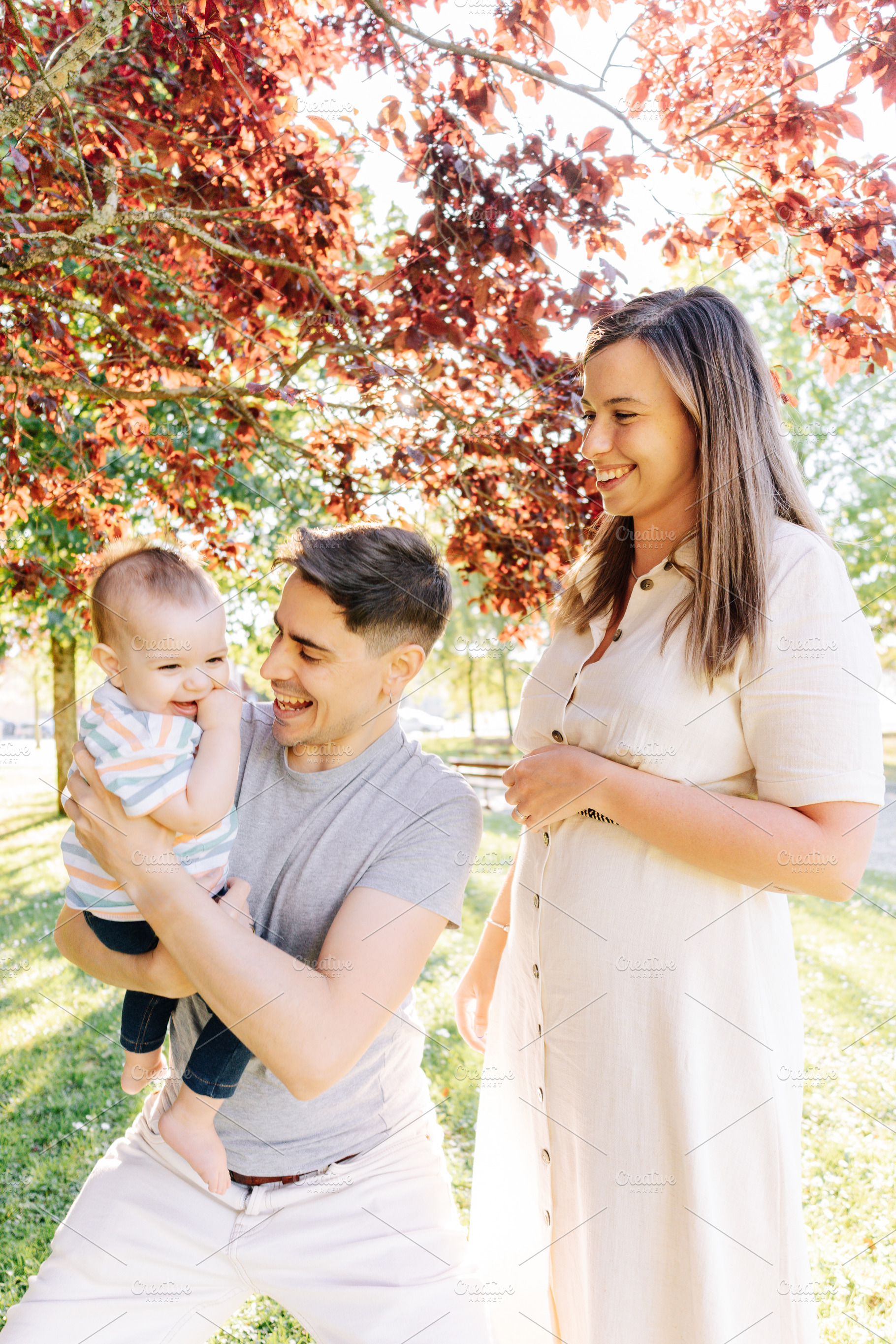 Portrait of a young family with their nine month old baby, a Person Photo by rubenchase