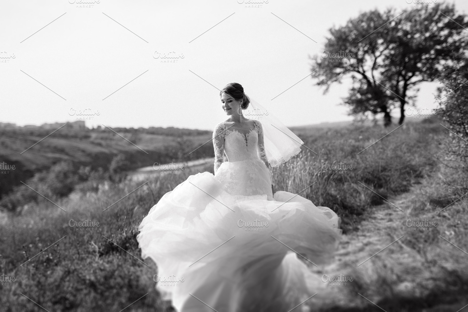 bride blonde girl with a bouquet in the forest, a Person Photo by Weddings, People, Travel