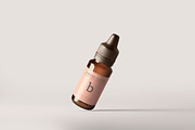 Amber Glass Dropper Bottle Mockups, a Cups & Container Mockup by pmvch (Thumbnail 11 of 20)