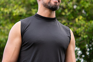 Confident male personal trainer standing outdoors in park looking away, a Sports & Recreation Photo by etorres69