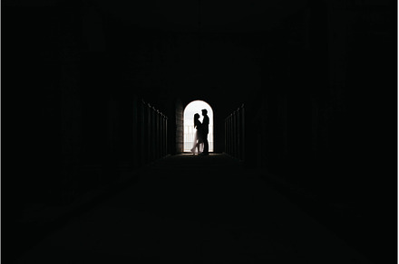 Silhouette of loving couple hugging, a Person Photo by olhovyi_photographer