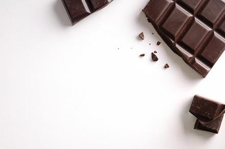 Broken chocolate bar isolated top, a Food & Drink Photo by Davizro's Market