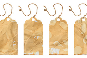 Vintage tags made of paper stained with coffee or tea. Each tag, a Business Photo by ndanko
