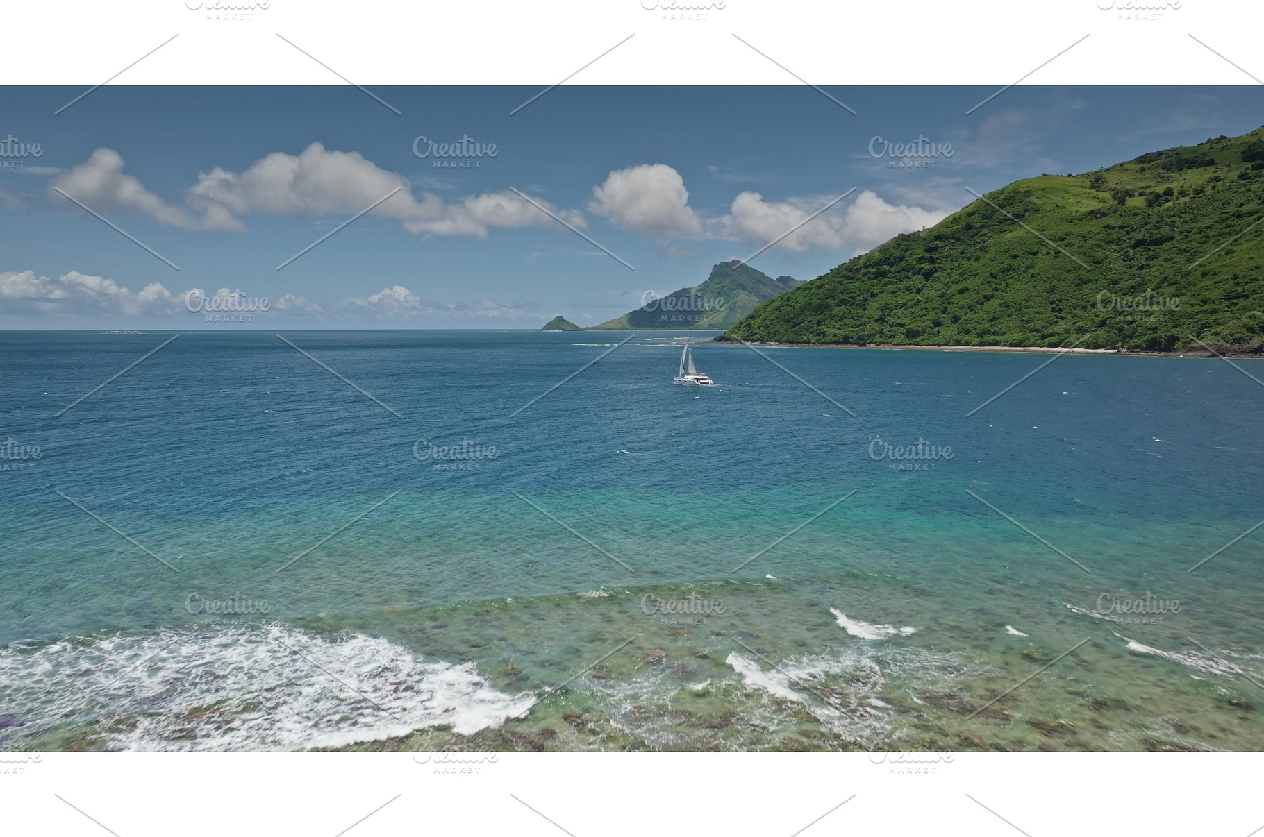 Catamaran sailing near tropical, a Nature Photo by Goinyk