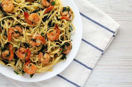 Homemade One-Pot Lemon Garlic Shrimp Pasta on a Plate on a white, a Food & Drink Photo by LiudmylaChuhunova