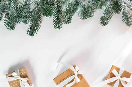 Gift boxes with snow fir branches featuring xmas, card, and background, a Holiday Photo by YuMyart