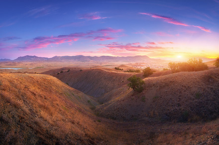 Mountain landscape at sunset featuring landscape, nature, and travel, a Nature Photo by den-belitsky