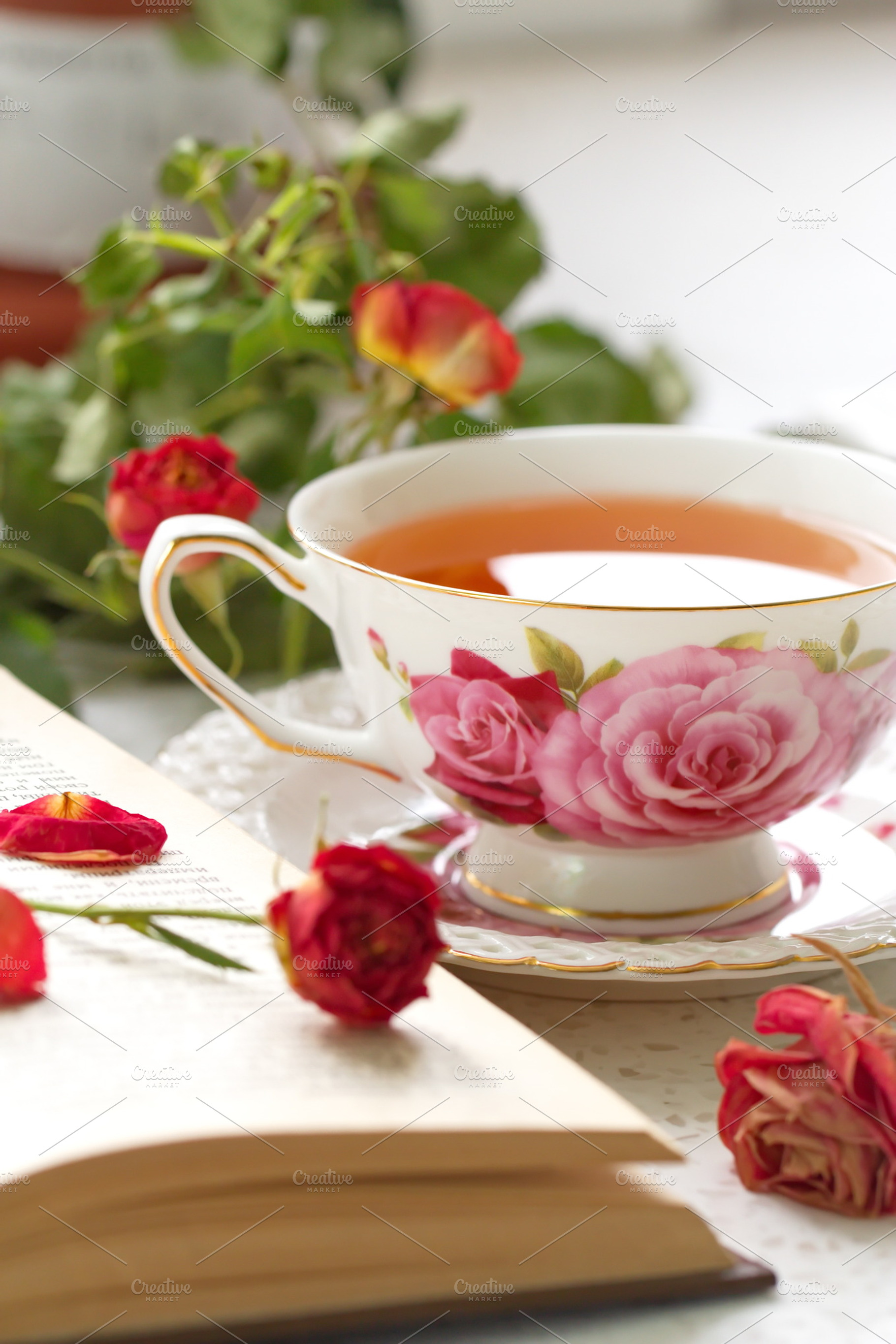 Cup of tea books and roses containing black, book, and bright, a Food & Drink Photo by lisa870