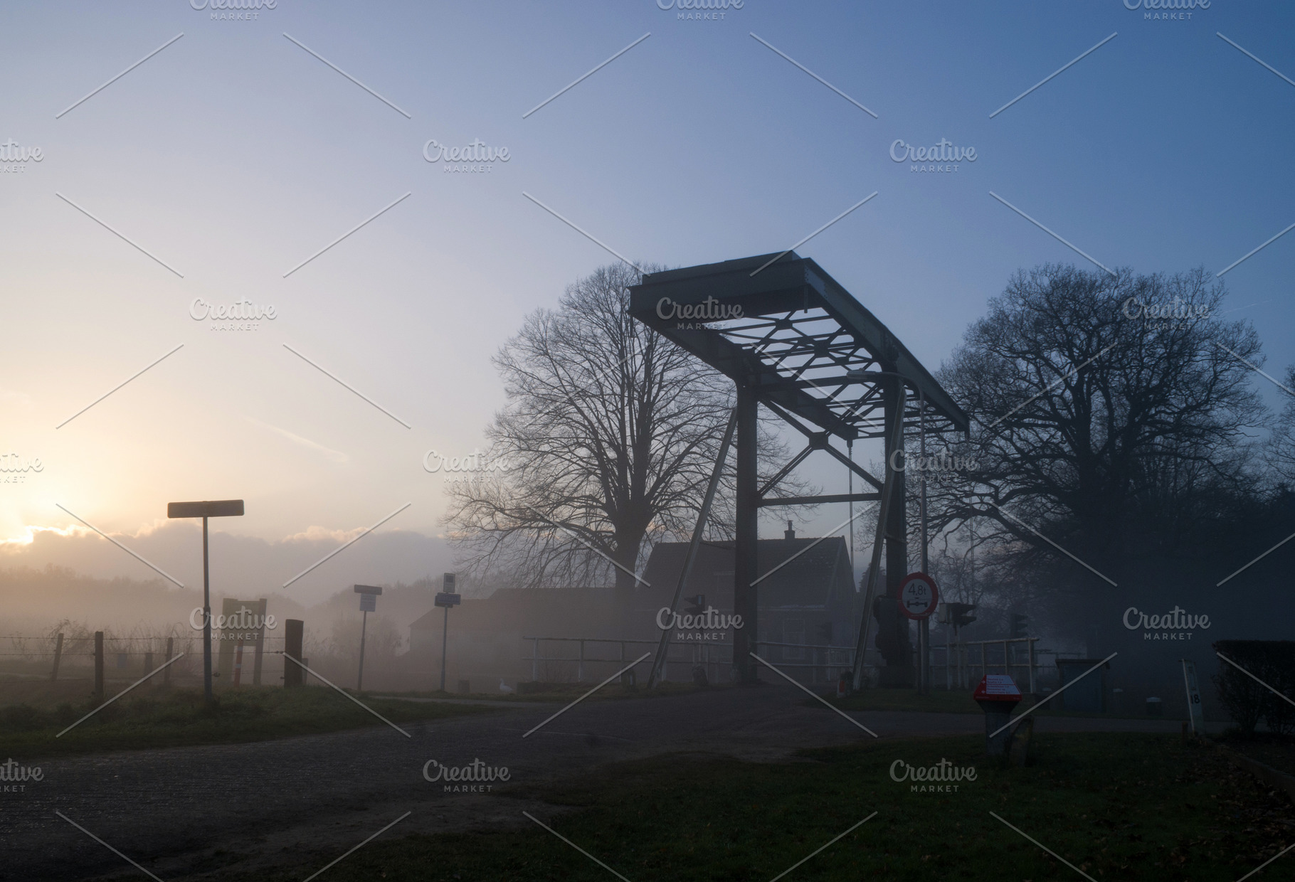 Drawbridge over a frozen canal, an Architecture Photo by John Stuij Photography