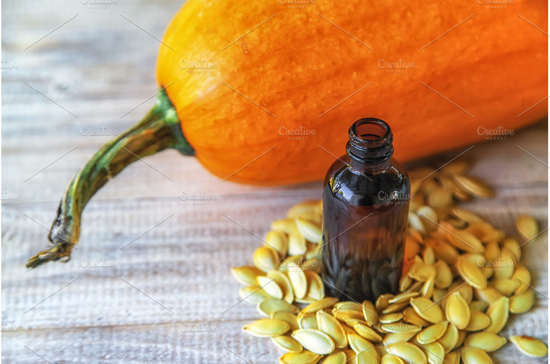 Pumpkin seed oil in a bottle, a Food & Drink Photo by yanadjana