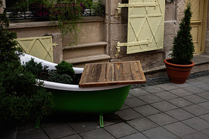 Rustic outdoor decor with potted plants and vintage elements, a Photo by AS photostudio