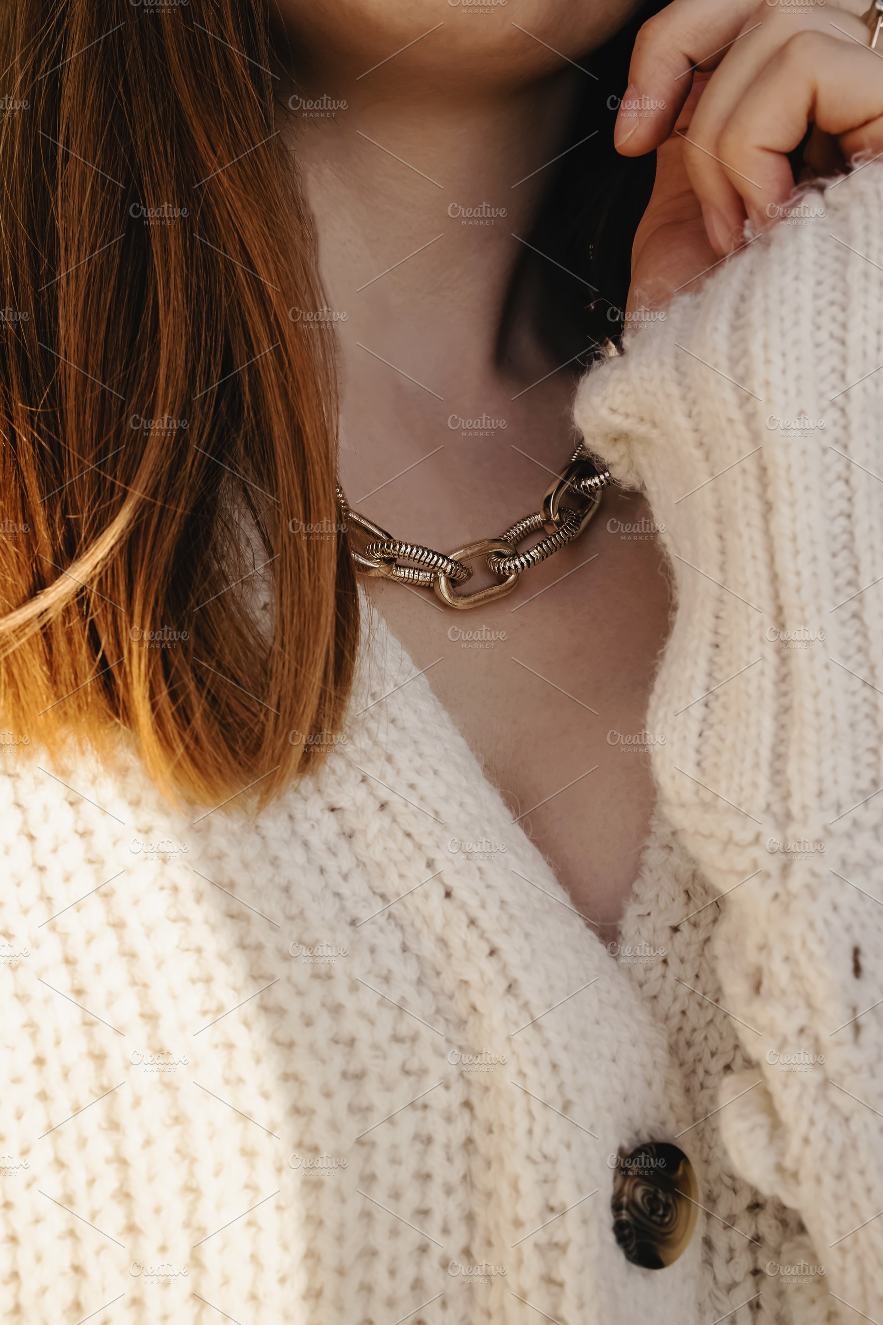 Close-up woman in white sweater, a Beauty & Fashion Photo by Imageblend
