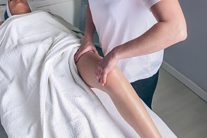 Massage therapist doing lymphatic dr containing massage therapist, lymphatic, a Beauty & Fashion Photo by davidpereiras