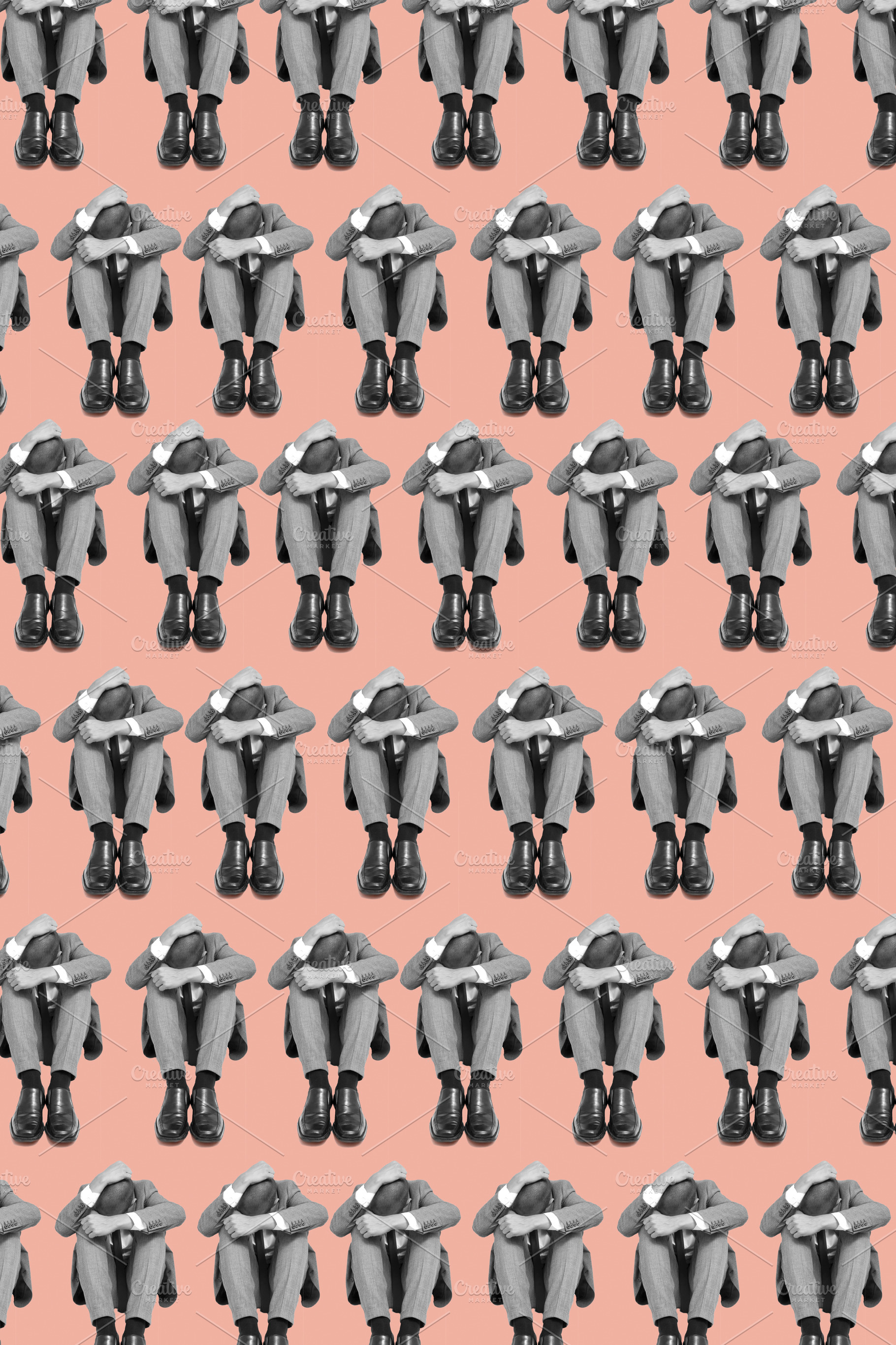 sad businessmen sitting in the floor forming a pattern, a Photo by Nito