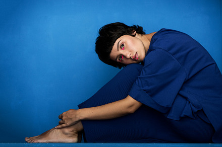 Young beautiful woman sitting on, a Person Photo by Aliona Serzhanova