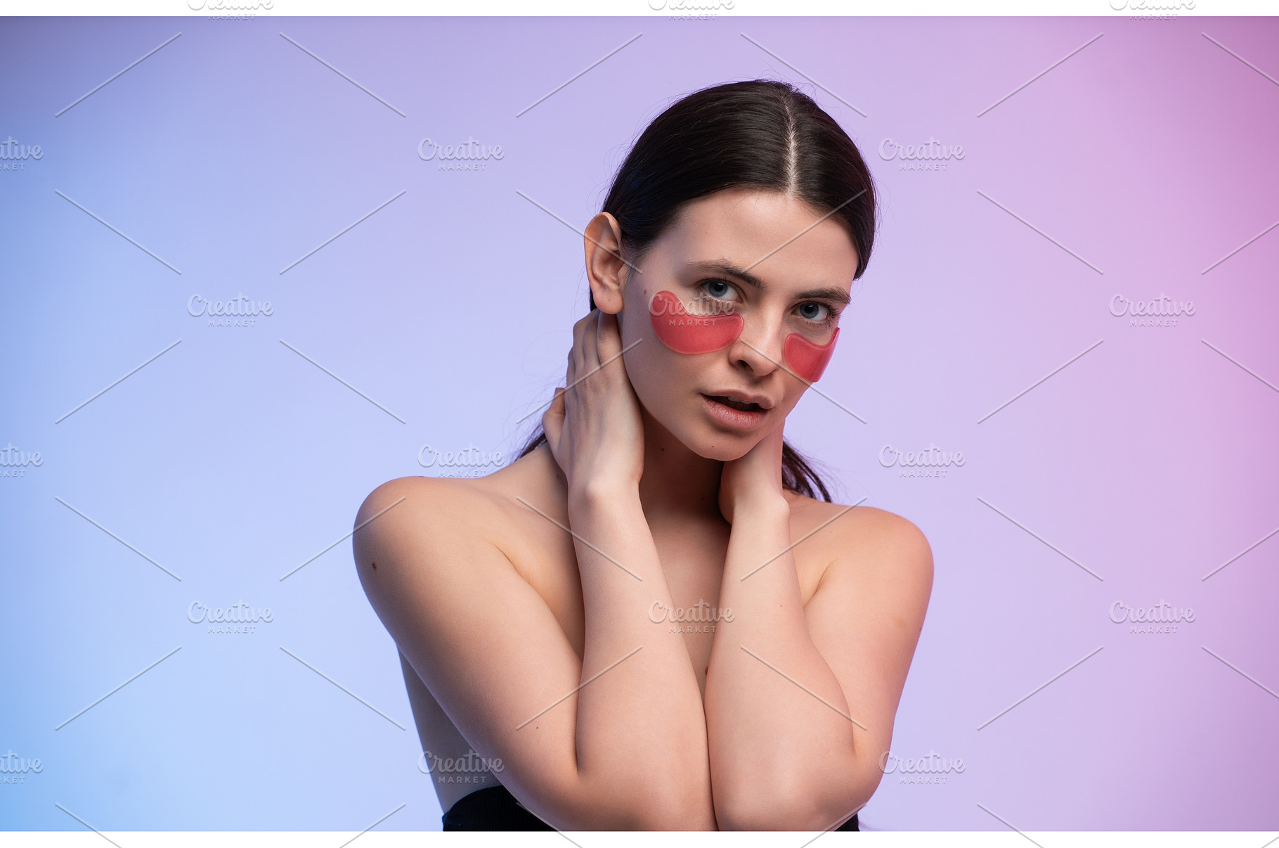 Woman applying eye patches for skin, a Health & Medical Photo by volodymyrshtun13795