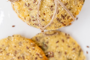 Healthy food grain pastry crackers stack jute flax, a Food & Drink Photo by Photo Drive Studio