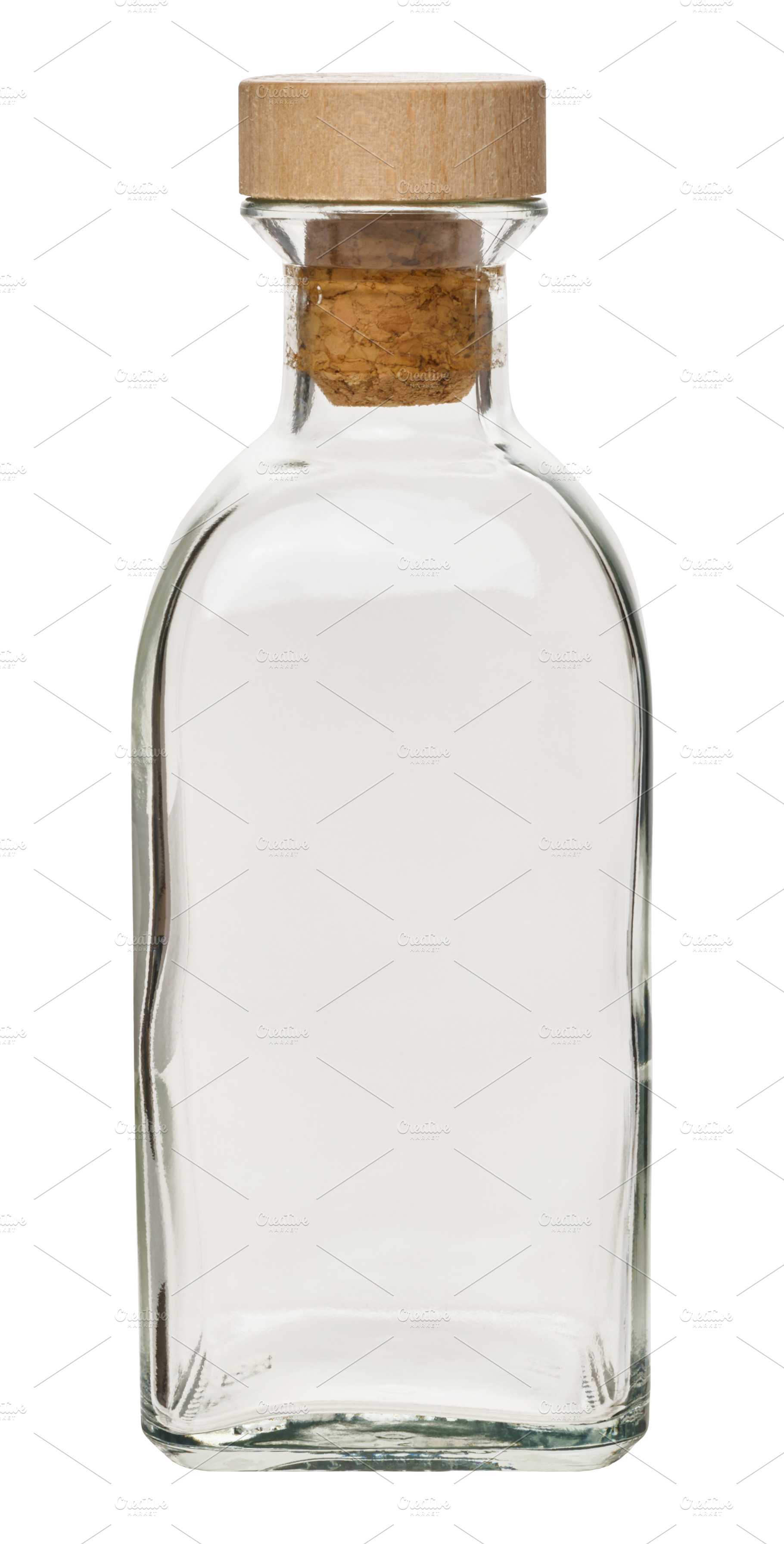 Empty transparent glass bottle with wooden lid for liquids on is, a Food & Drink Photo by ndanko