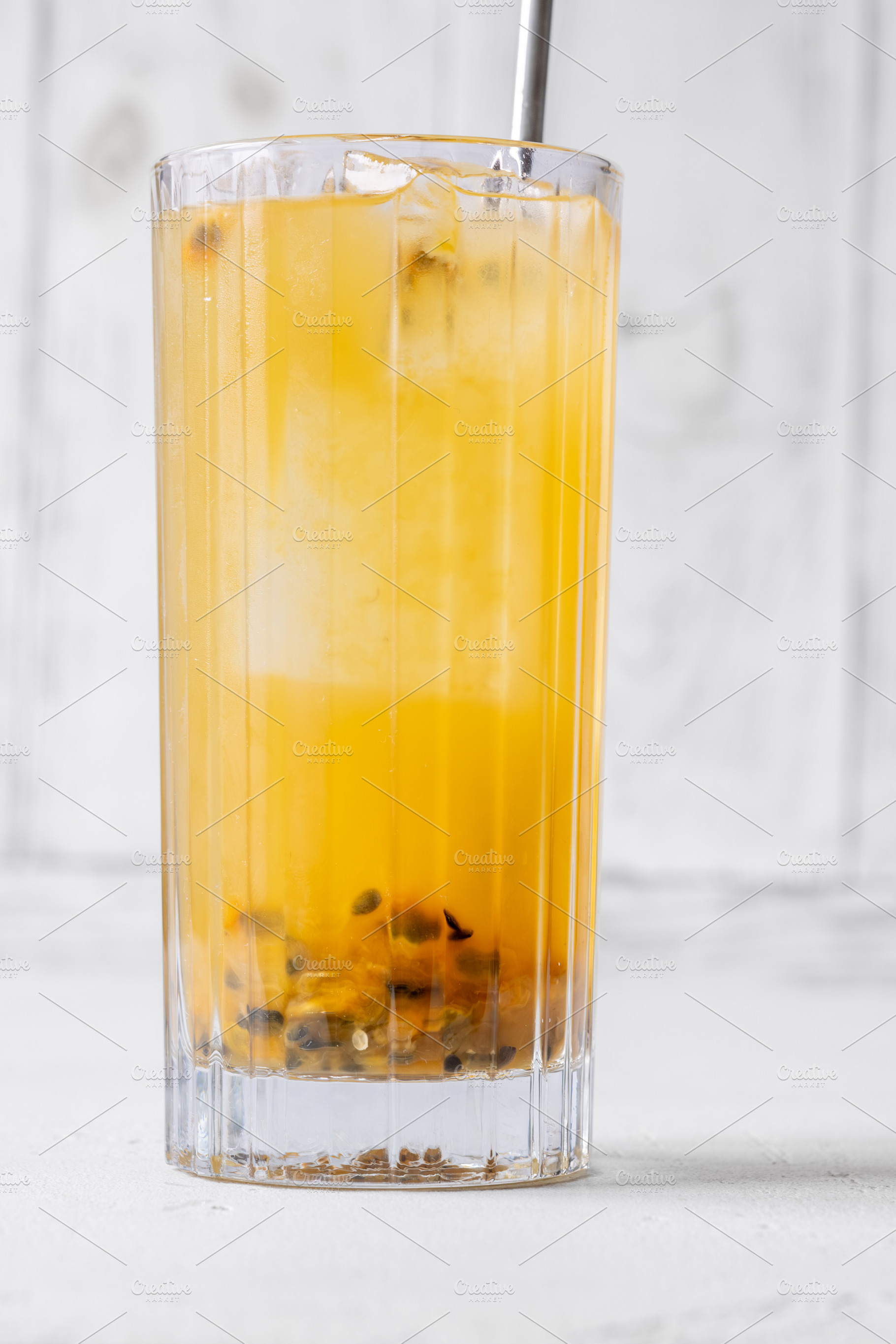 Passion Fruit Caipirinha cocktail, a Food & Drink Photo by Alexander Prokopenko