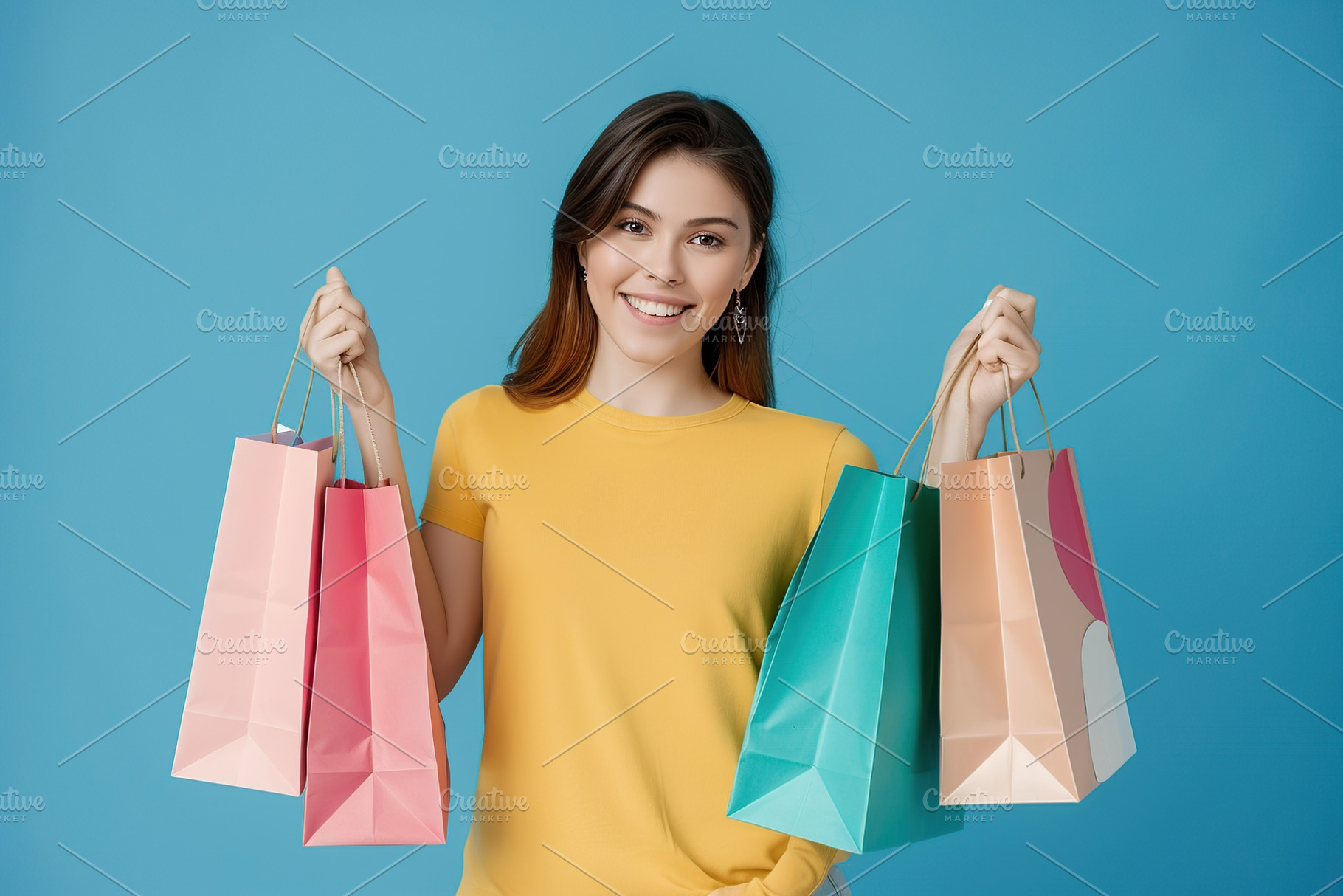 Young smiling woman holding colorful paper shopping bags, a Person Photo by AlyaAnd