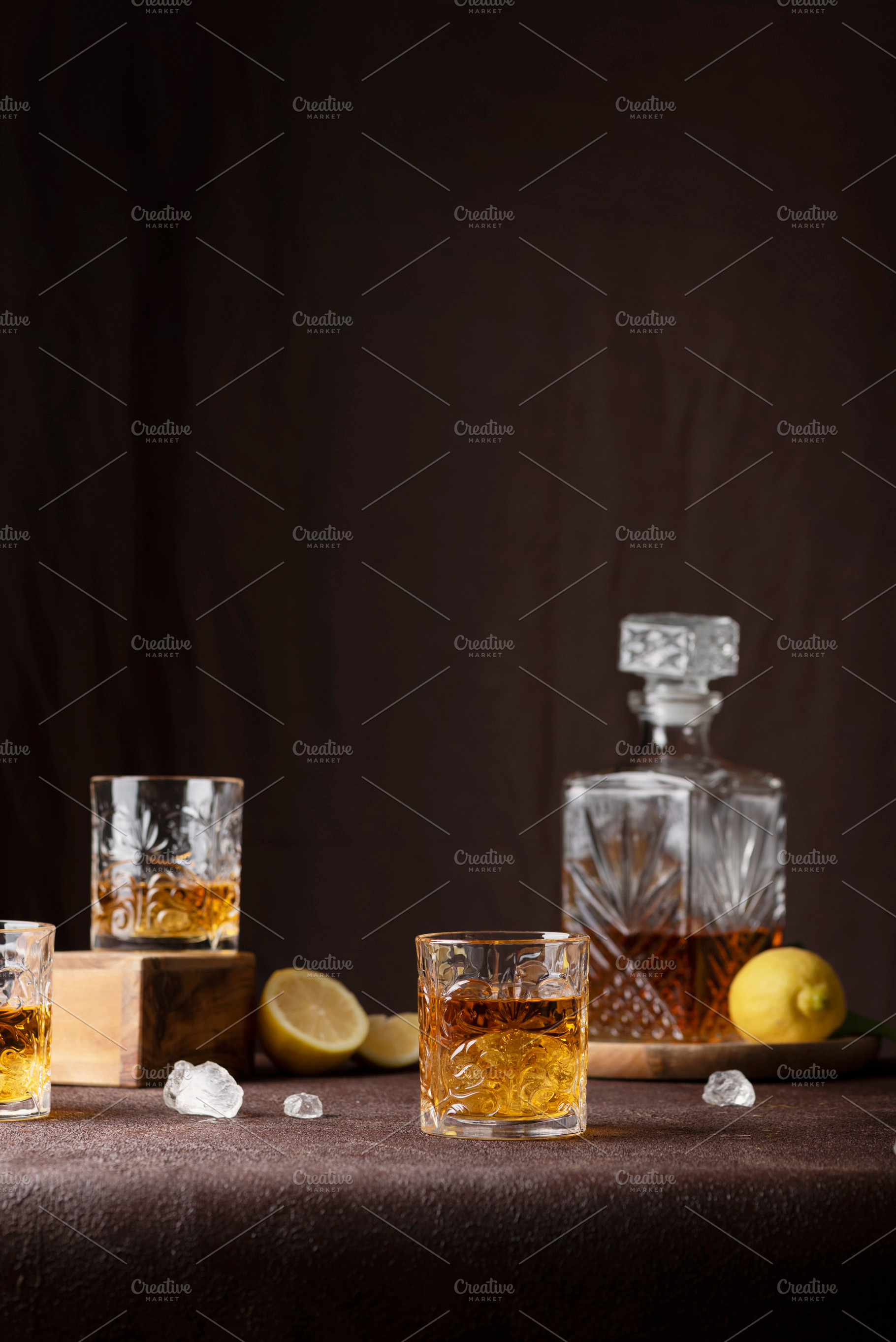 Glasses of rum with ice and lemon, a Food & Drink Photo by oxana.denezhkina