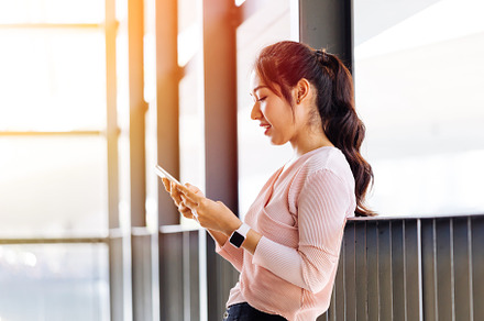 Asian woman leaning on handle stock photo containing woman and asian, a Person Photo by Twinster Photo