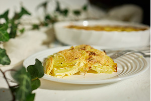 Creamy potato dish served in a cozy, a Food & Drink Photo by IlliaBondarPhotography