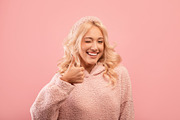 Pretty stylish lady showing thumb up, winking and smiling at camera, recommendi, a Photo by Prostock-Studio (Thumbnail 2 of 2)