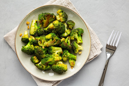 Homemade Pan-Fried Broccoli on a Plate, top view. Flat lay, over, a Food & Drink Photo by LiudmylaChuhunova