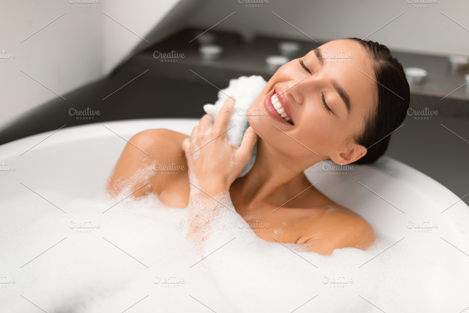 Woman Taking Bath Rubbing Neck With Sponge Bathing In Bathroom, a ...