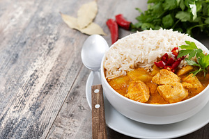 Massaman curry isolated on white background. Traditional Thai food recipe, a Food & Drink Photo by etorres69