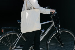 Woman holding eco bag or cotton tote
