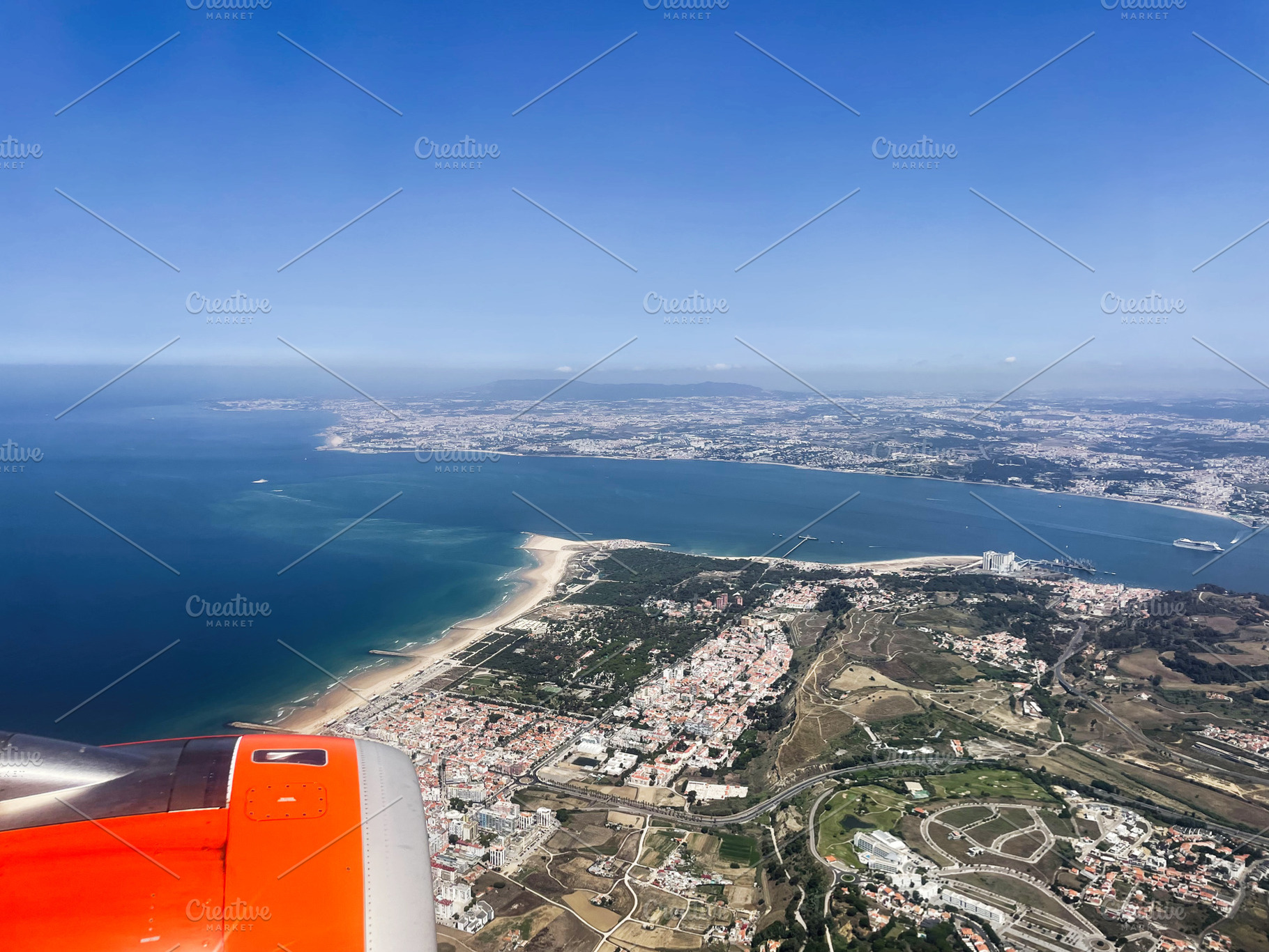 Aerial view of Cascais coastline with ocean, shore, and landscape on a sunny da, a Photo by AS photostudio