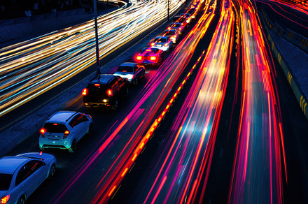Car traffic light at night city., a Transportation Photo by Eugene_Photo