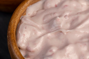 creamy yogurt and ripe red currants, a red fermented milk product, a Photo by rsoollAI