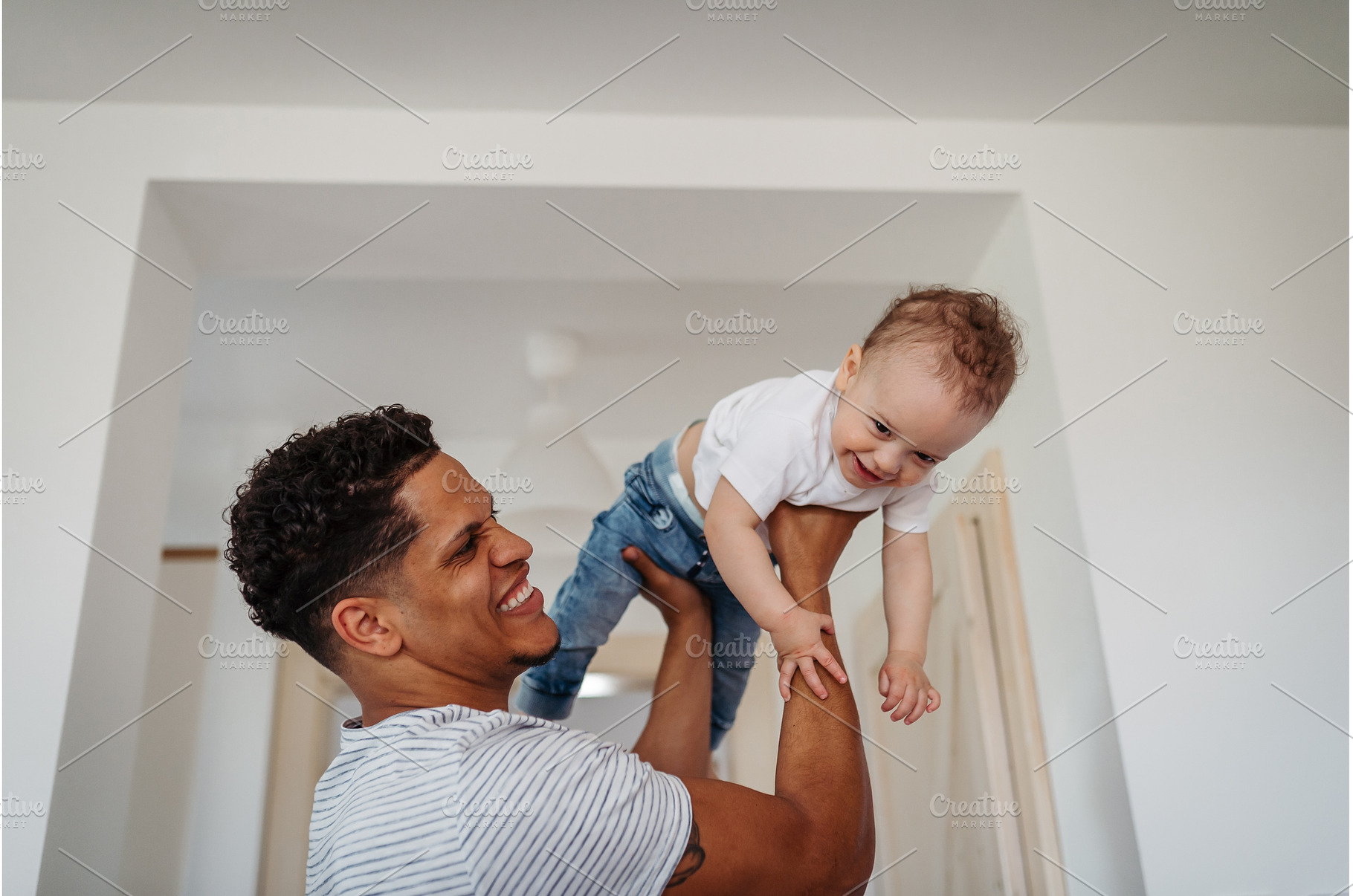 Father and small toddler son. Dad, a Person Photo by HalfPoint