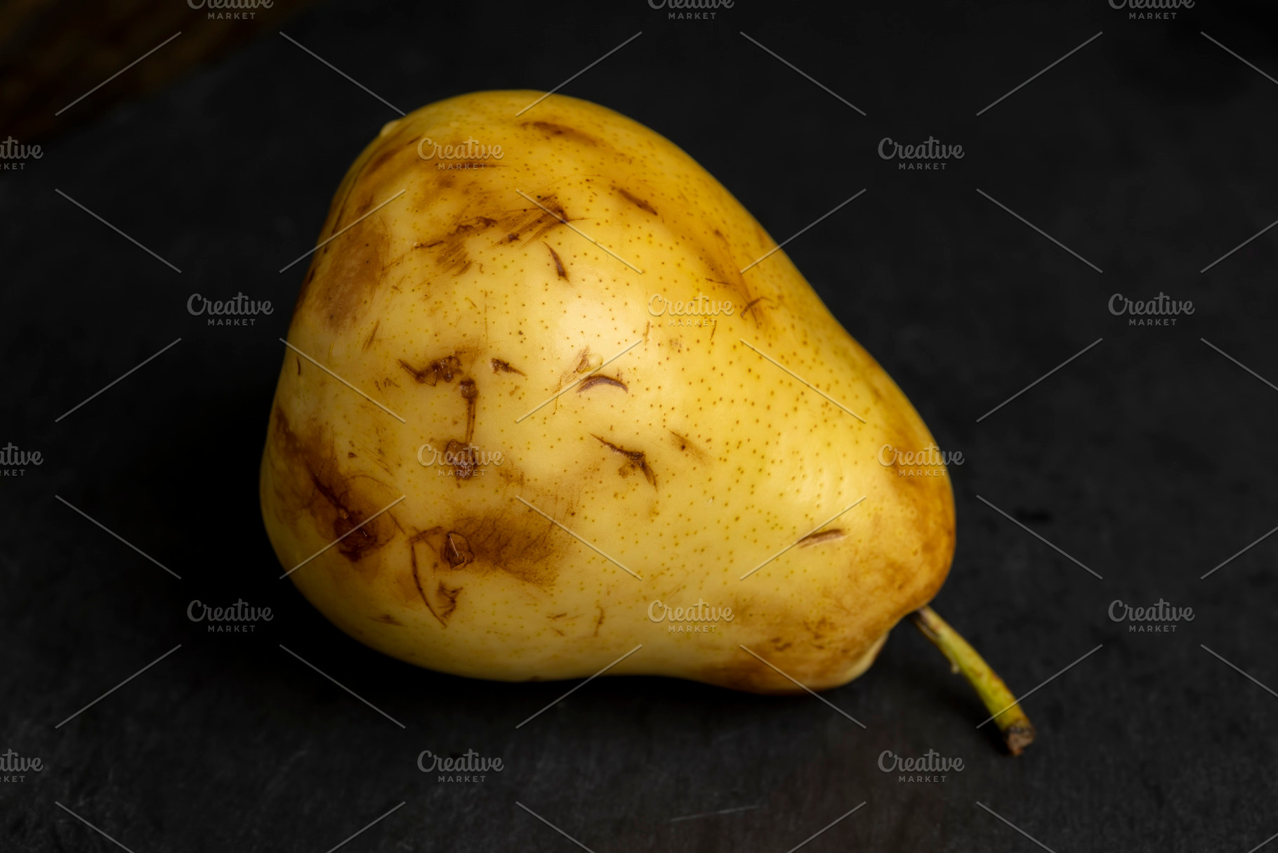 ripe green and yellow pear on a board, a Photo by MyPhotos
