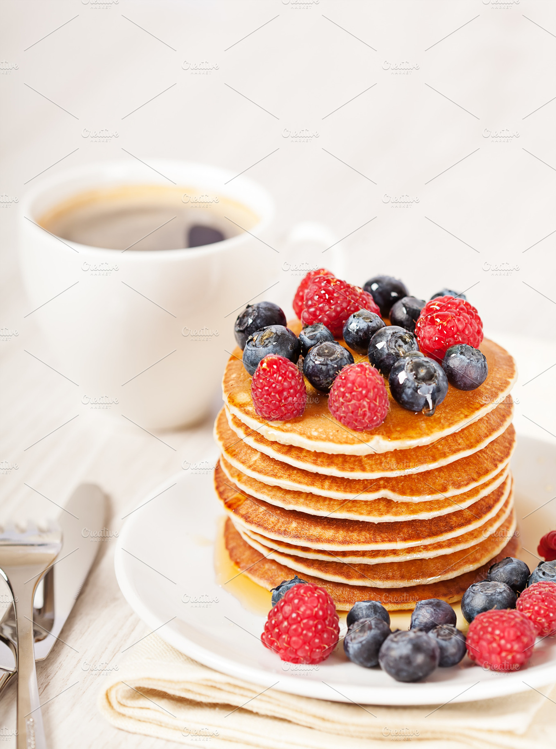 Stack of pancakes with berries breakfast stock photo containing background