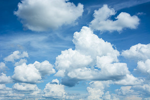 White fluffy clouds in the blue sky stock photo containing air and atmosphere