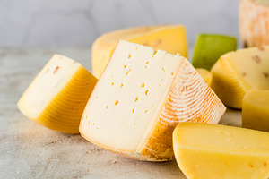 Various kind of craft cheese. Cheese assortment of different typ, a Food & Drink Photo by vimart