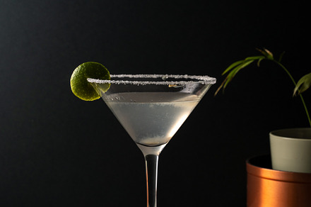 Margarita cocktail with lime in a salted rimmed glass on earthy, a Food & Drink Photo by SZ IMAGE