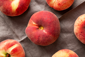 Fresh juicy ripe fig peaches, top view. Overhead, from above., a Food & Drink Photo by LiudmylaChuhunova