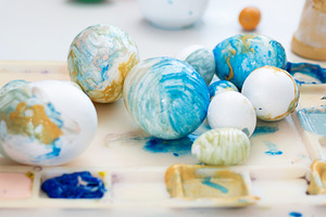 Painted Easter eggs on art palette, a Person Photo by etorres69