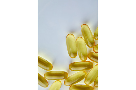 Flat lay fish oil capsules Omega 3, a Health & Medical Photo by IlliaBondarPhotography