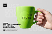 Coffee Mug Hand Holding Mockup, a Cups & Container Mockup by Toasin Studio (Thumbnail 1 of 4)