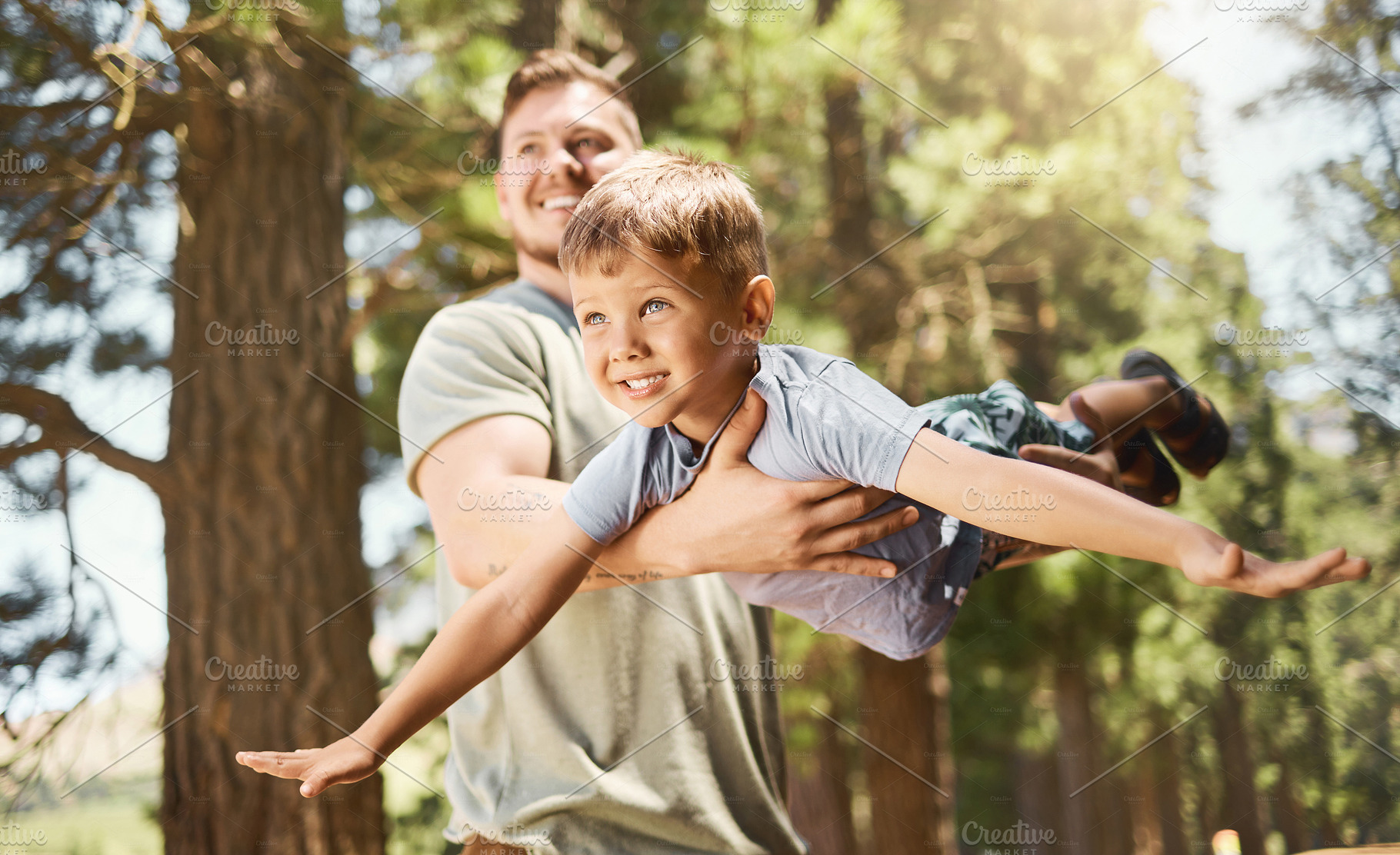 Flying with dad, a Photo by Peopleimages.com