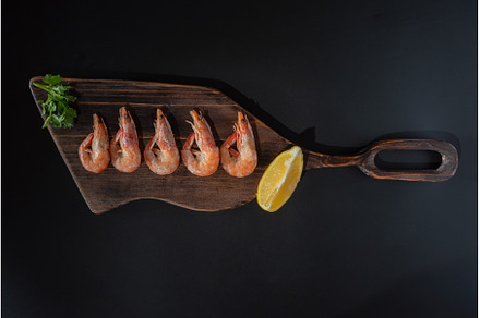 Boiled shrimps on a cutting board
